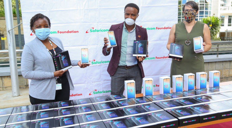 Safaricom partners with Dignitas to donate tablets to students in Kawangware and Dandora